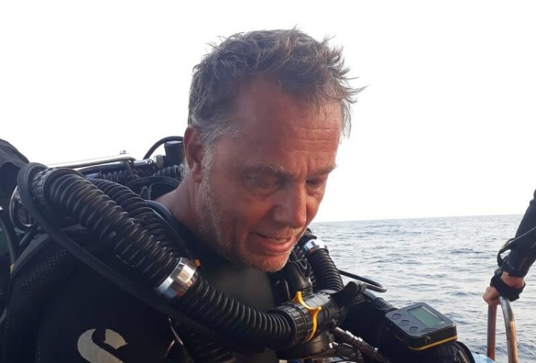 tim lawrence on the boat in tech diving gear during seacrest and tottori maru 2020 expedition